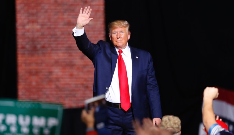 President Donald Trump waves at a campaign rally in Battle Creek, Mich., Wednesday, Dec. 18, 2019.