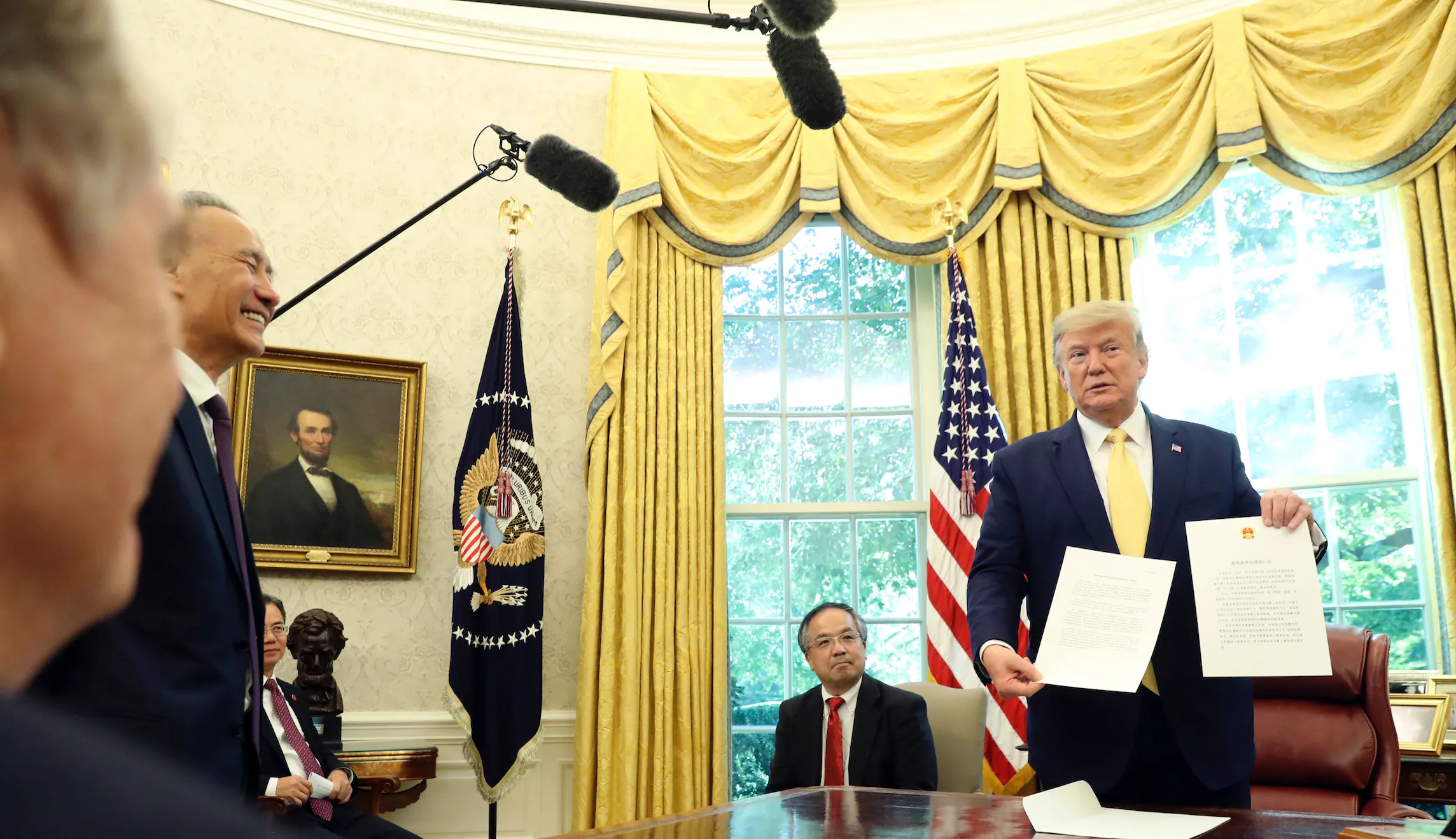 Stocks jump as Trump announces partial trade pact with China