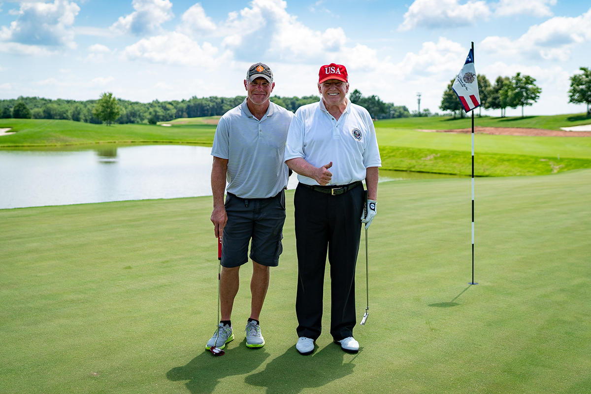 Trump golfs with Brett Favre