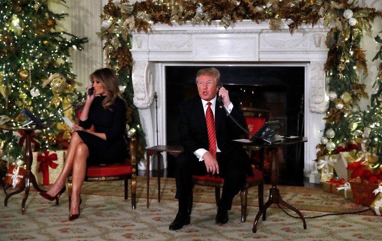 President Donald Trump answers a question about the shutdown saying, âNothing new on the shutdown. We need more border security,â in answer to a reporter's question as he and first lady Melania Trump each spoke on the phone sharing updates to track Santa's movements from the North American Aerospace Defense Command (NORAD) Santa Tracker on Christmas Eve, Monday, Dec. 24, 2018. (AP Photo/Jacquelyn Martin)