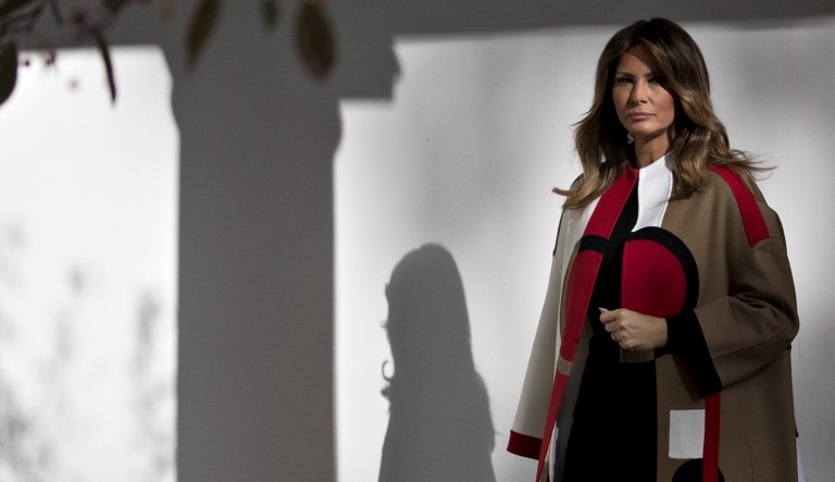 First lady Melania Trump walks through a colonnade of the White House before a national Thanksgiving turkey pardoning ceremony in Washington, D.C., on Tuesday, Nov. 20, 2018.
