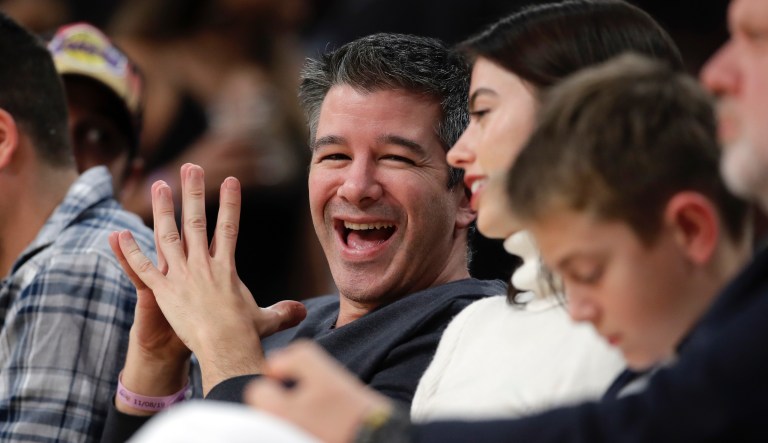Uber founder Travis Kalanick smiles while watching an NBA basketball game between the Los Angeles Lakers and the Miami Heat Friday, Nov. 8, 2019, in Los Angeles.