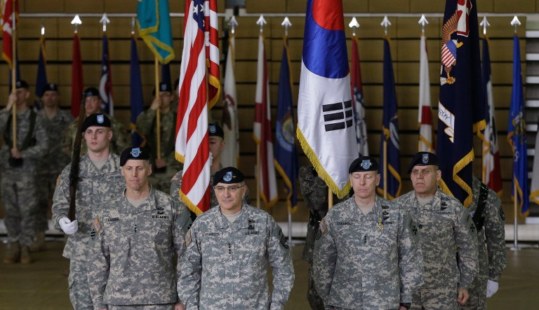 Incoming Commander General of the Eighth U.S. Army, Lt. Gen. Thomas S. Vandal, second from left, ROK-US Combined Forces Command and U.S. Forces Korea Commander Curtis Scaparrotti, center, and outgoing Commander General of the Eighth U.S. Army, Lt. Gen. Bernard S. Champoux, second from right, stand during a change of command ceremony at Yongsan Garrison in Seoul. South Korea, Tuesday, Feb. 2, 2016.
