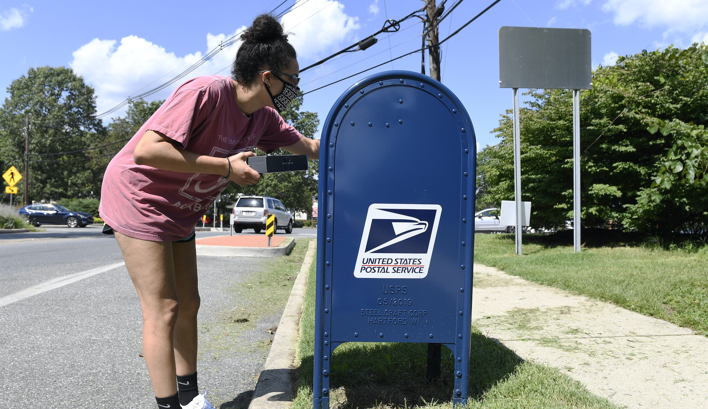 Federal judge orders Postal Service to reverse collection limits to ensure election mail delivery