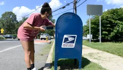 Federal judge orders Postal Service to reverse collection limits to ensure election mail delivery