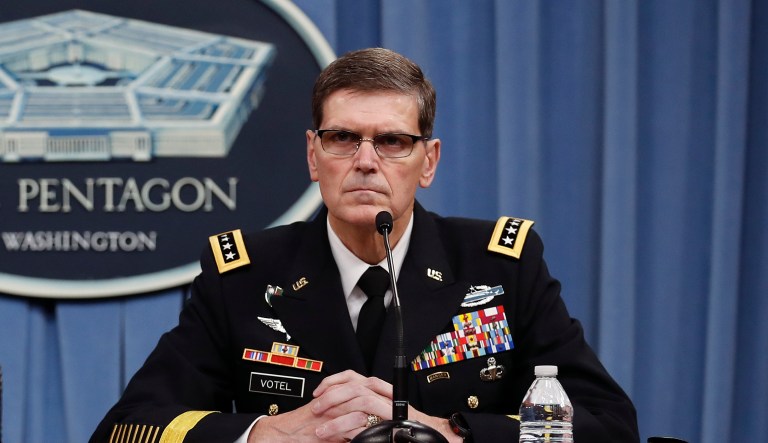 Defense Secretary Jim Mattis, left, and Gen. Joseph Votel, listen to questions during a news conference at the Pentagon, Tuesday, April 11, 2017. Mattis said the campaign against the Islamic State group is still the main focus of the U.S. in Syria and remains on track.