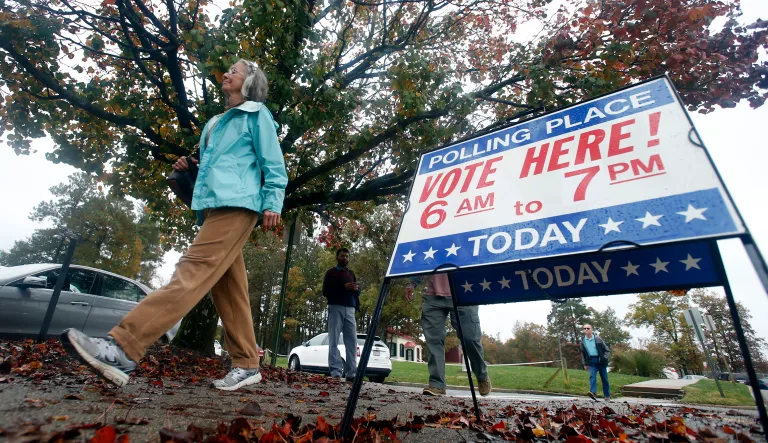 Voters enter a polling station in Short Pump, Va., Tuesday, Nov. 6, 2018.
