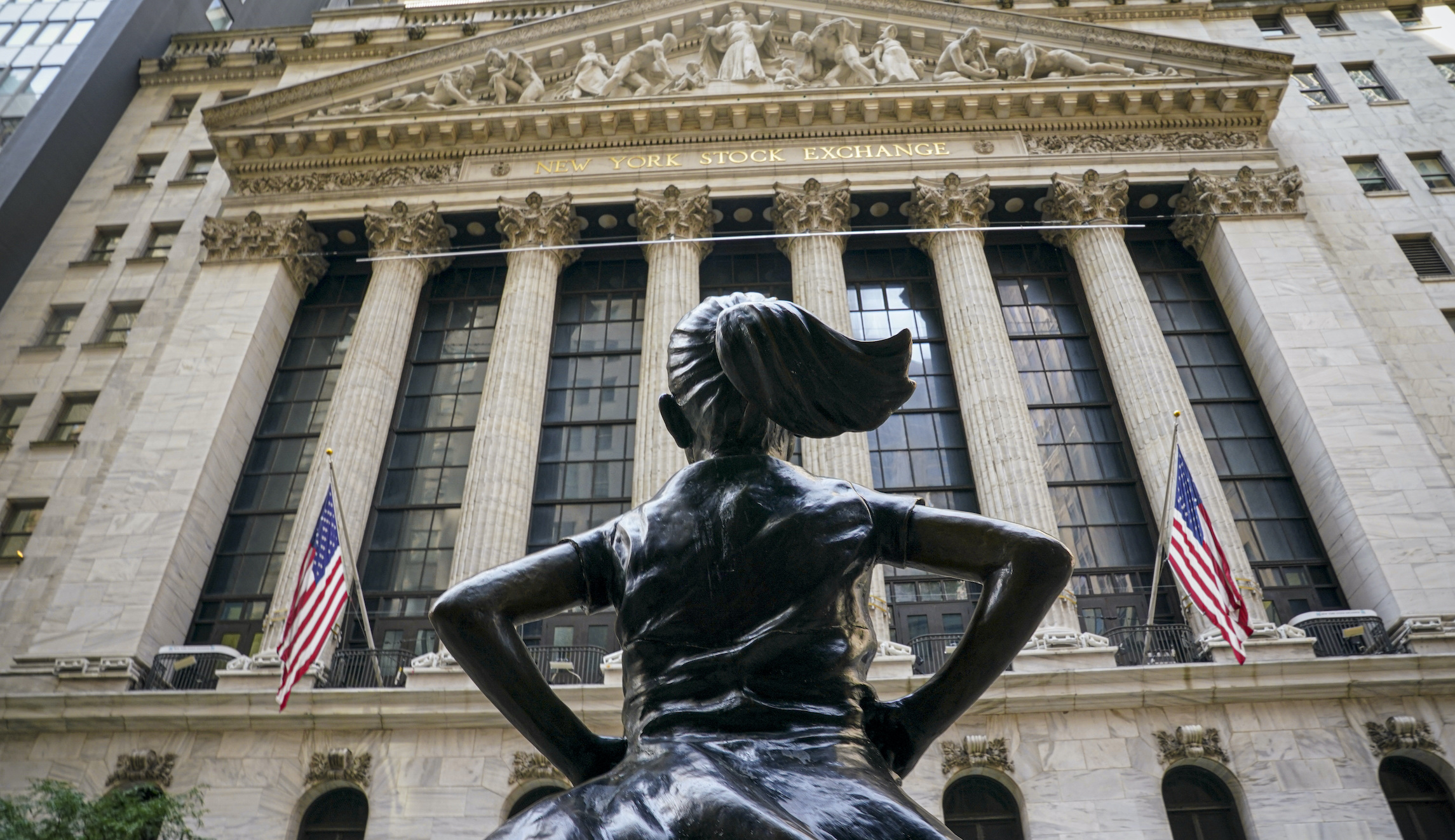 Dow Jones erases most pandemic losses and finishes up on the year