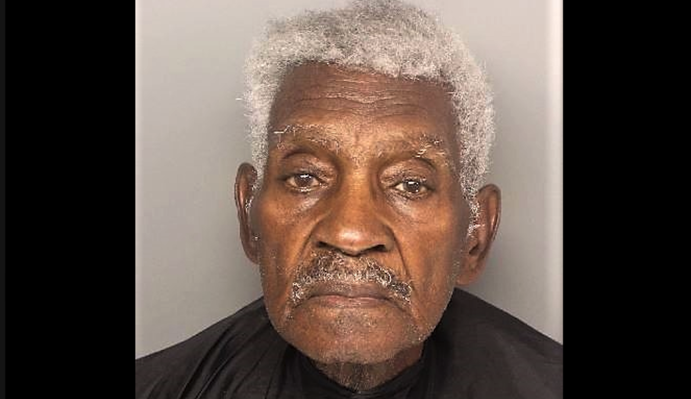 86-year-old man charged in masked bank robbery