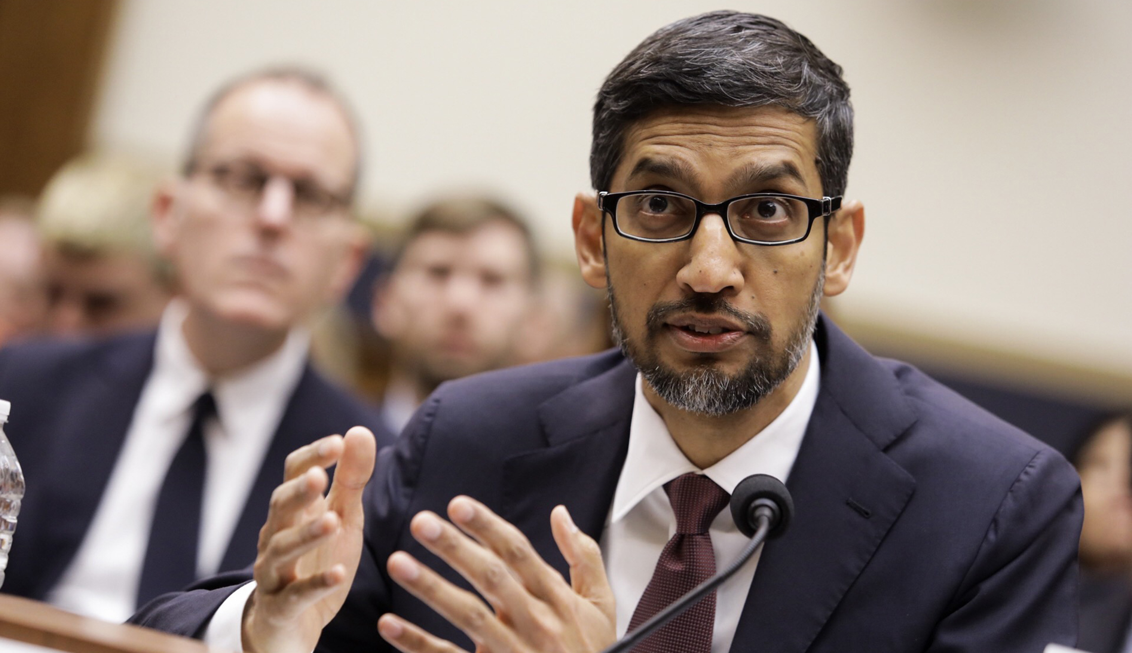 Google CEO drops hints of future search service in China