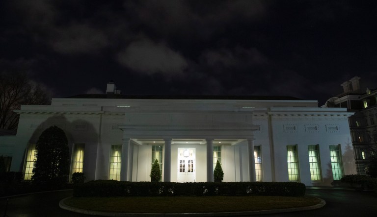 All the lights are on in the windows of the West Wing of the White House after news of a missile attack on an Iraqi air base housing U.S. troops, Tuesday, Jan. 7, 2020, in Washington. 