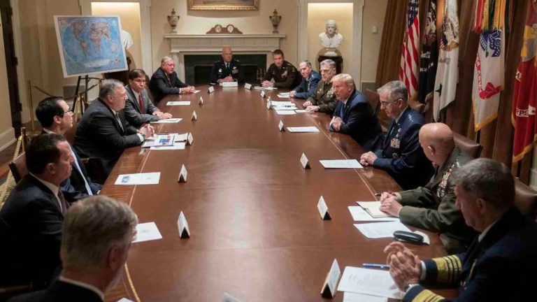 Top civilian and military leaders gather in the Cabinet Room in the West Wing of the White House for a national security meeting Saturday, May 9, 2020.