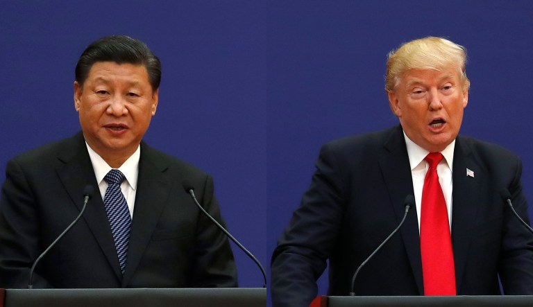 President Trump and Chinese President Xi Jinping speak during a business event. 