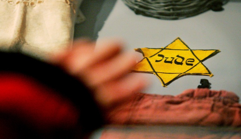 A yellow Star of David Jews were forced to wear by the Nazis, is seen with other belongings of holocaust survivors from the Auschwitz-Birkenau concentration camp that are on display at the Yad Vashem Holocaust Memorial in Jerusalem, Monday, Jan. 24, 2005. Sixty years ago, on Jan. 27, 1945, Red Army soldiers liberated the Concentration Camp in Auschwitz, Poland.