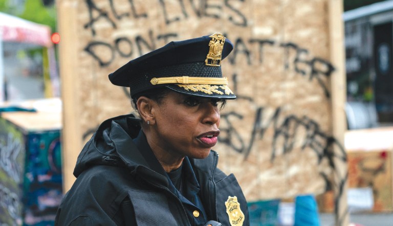 The thin line between their race and their badge