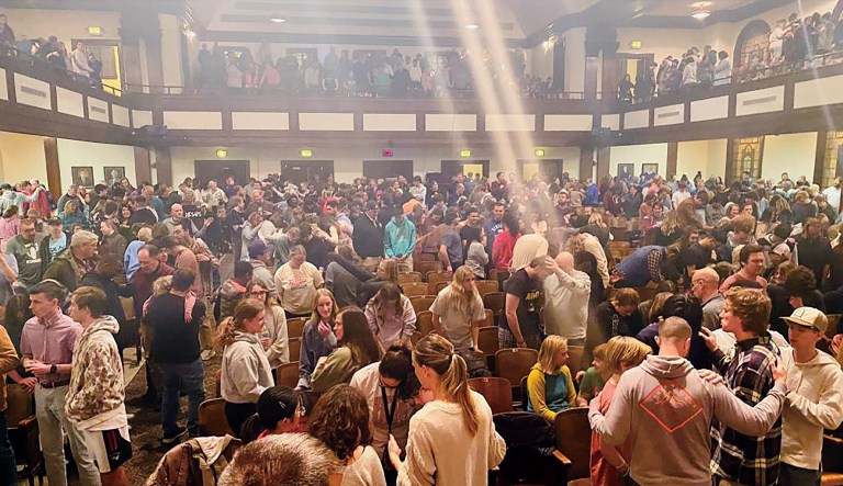 Students and visitors participate in a revival service held at Hughes Auditorium at Asbury University in Wilmore, Kentucky.Â 