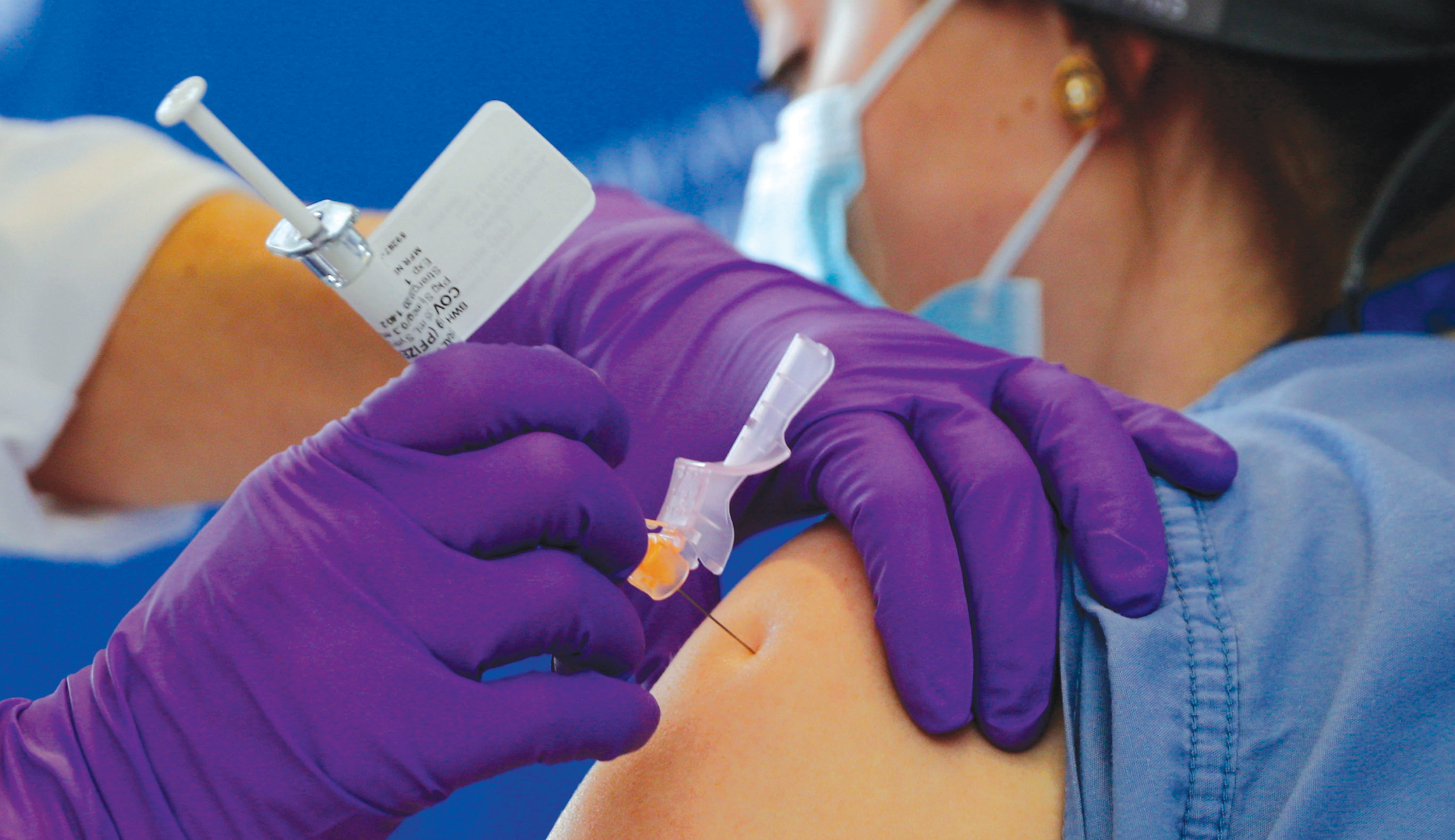 Federal panel requests adults over 75 and front-line and essential workers be next in line for vaccine