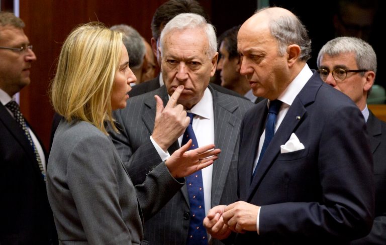 EU halts Russia talks, threatens sanctions