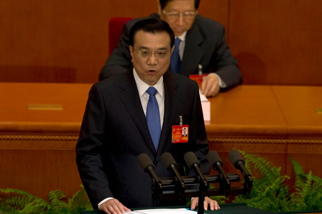 China vows to address stifling smog, terror threat