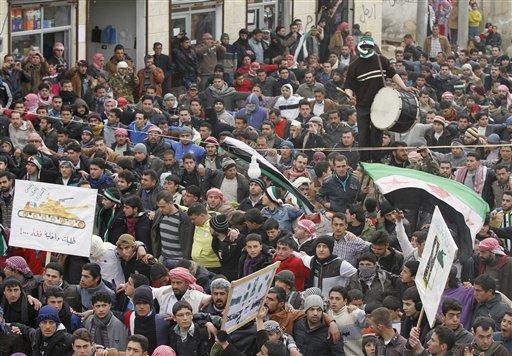 Obama cites violence in closing embassy in Syria