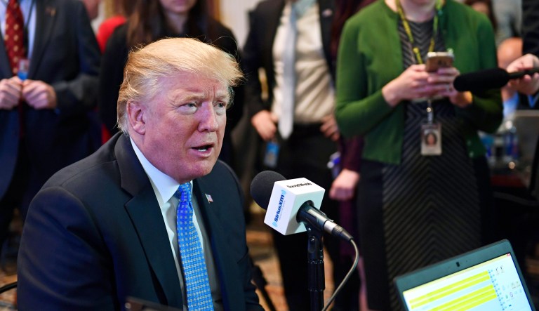 Trump floods conservative radio to sell tax reform
