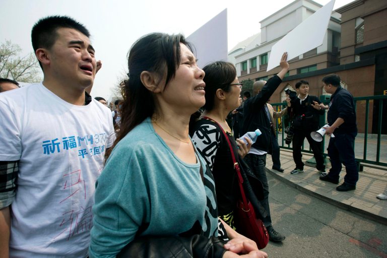 Chinese relatives of passengers protest at embassy