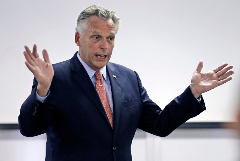 Ad criticizing Ken Cuccinelli shows pic of FBI raid into business owned by Terry McAuliffe pal