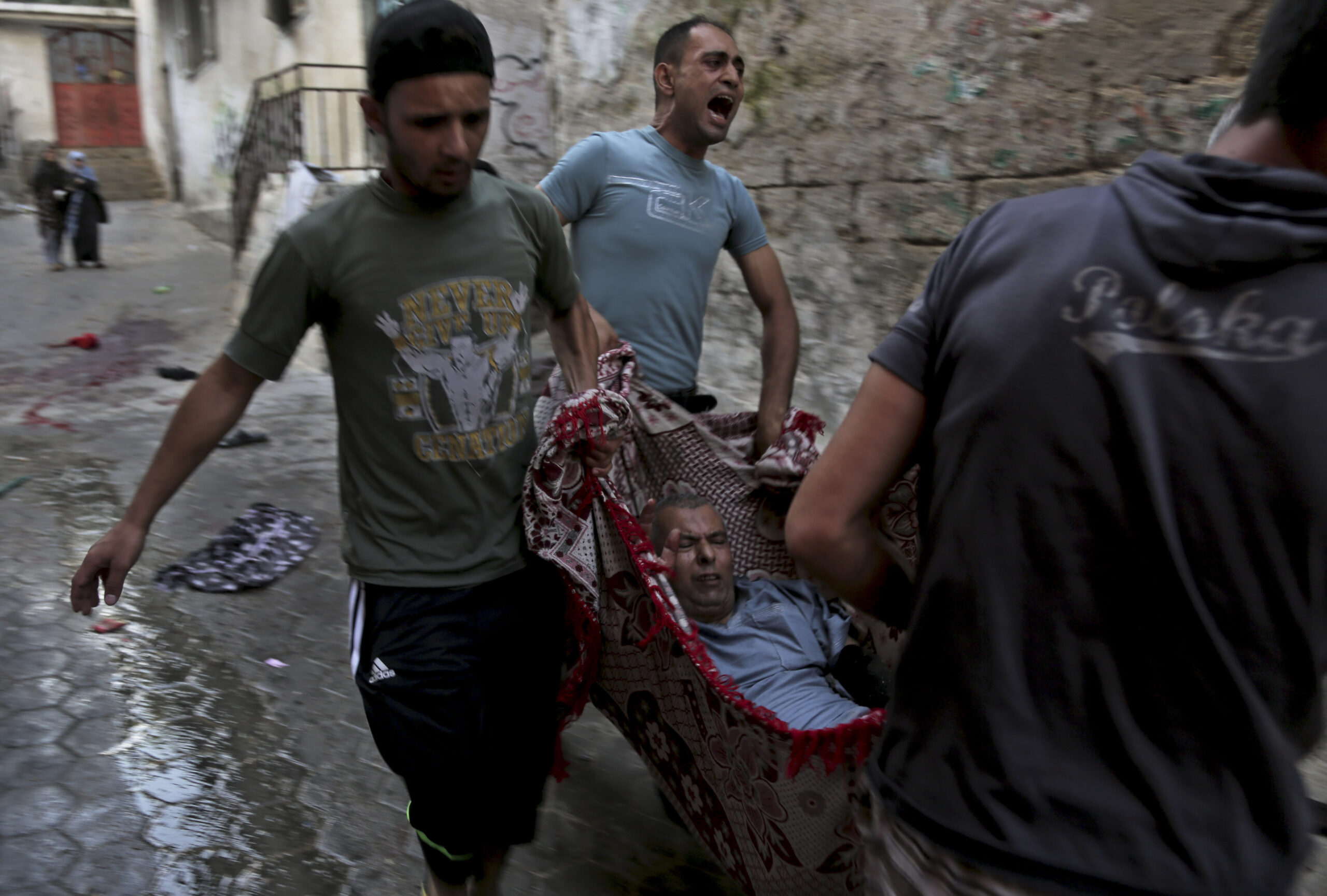 Deadly Israeli strikes hit UN school, market area