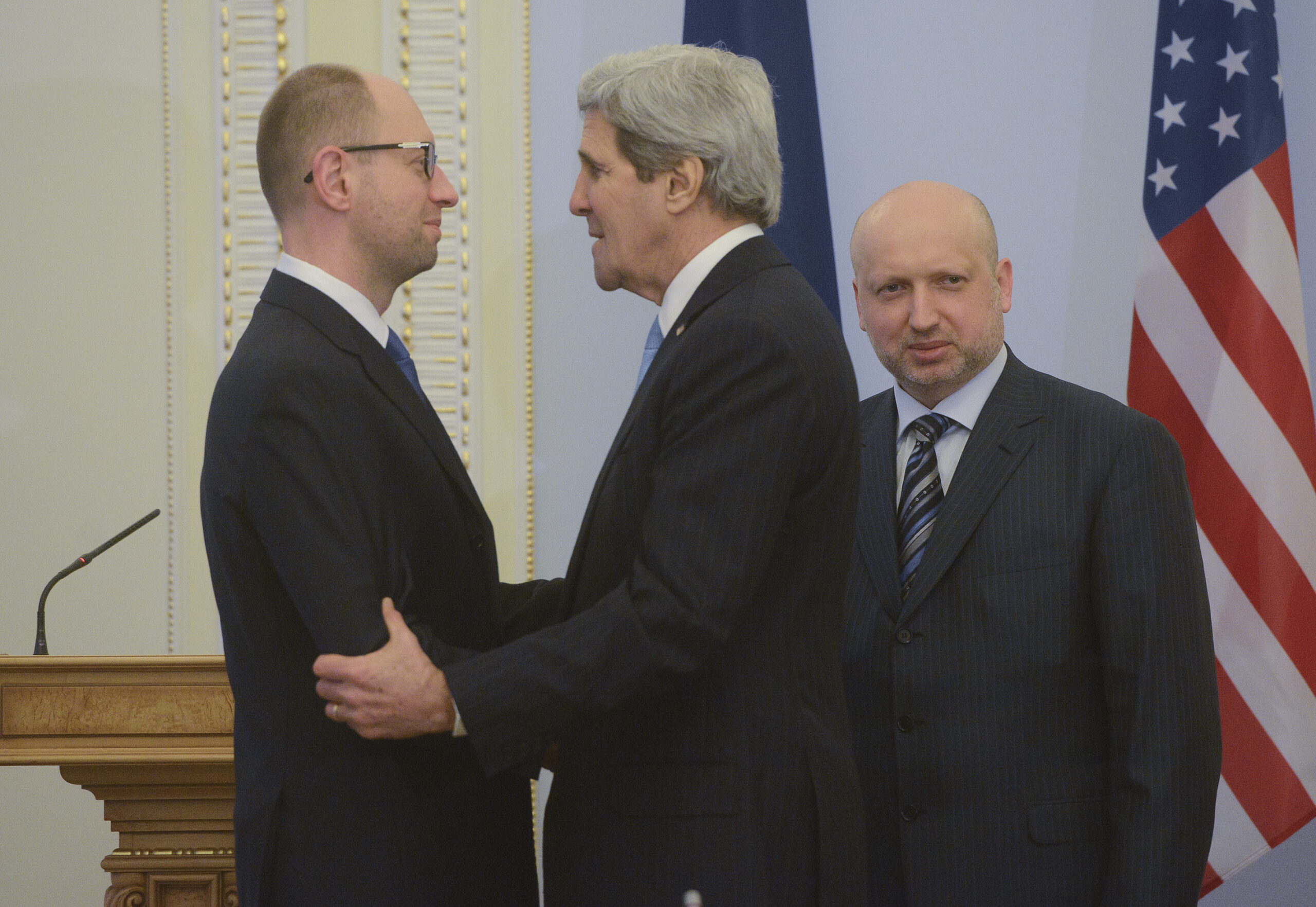 In Kiev, Kerry visits protest sites, promises aid