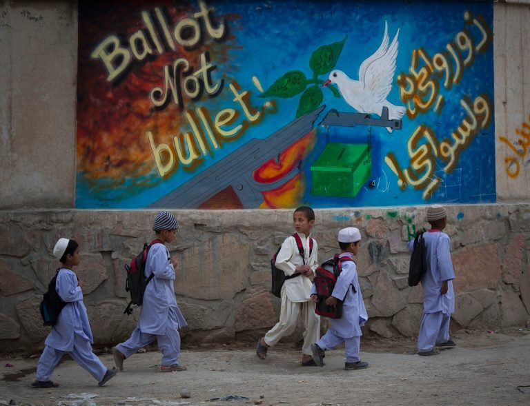 In Afghan race, wooing votes with ethnic strongmen
