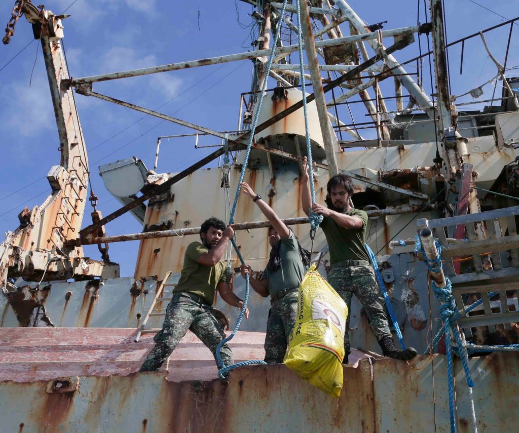 Philippine supply ship evades Chinese vessel