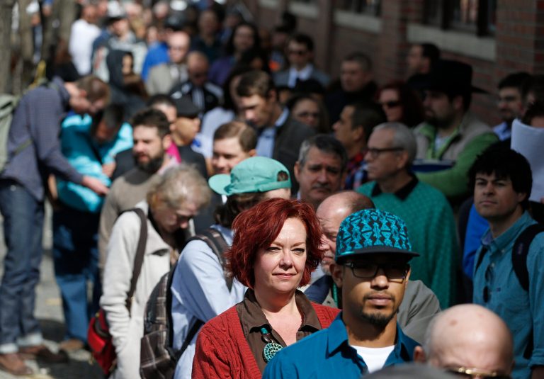 Applications for US jobless aid dip to 4-month low