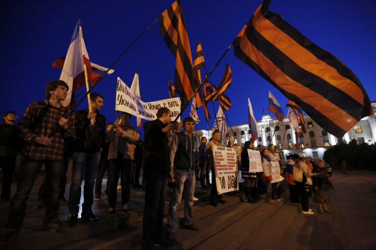 Reid slams GOP over Crimea; Senate bill advances