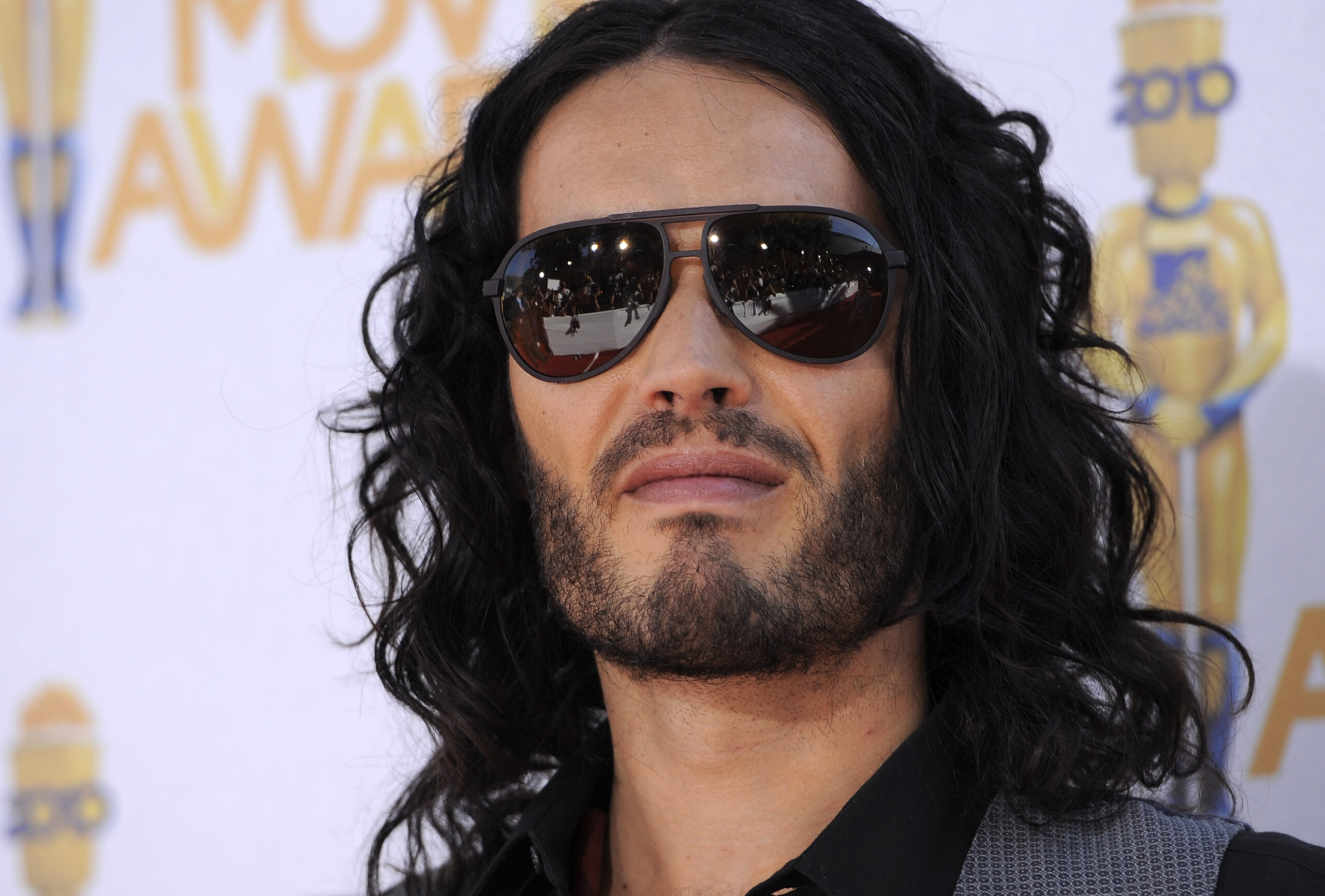 Russell Brand criticized for showing tarot cards in video posted day after baptism