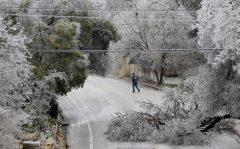 Texans hunker down for winter freeze with a watchful eye on power grid