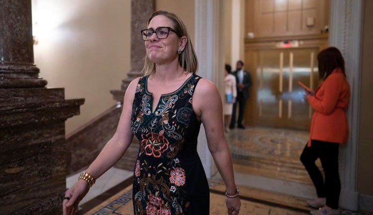 Sen. Kyrsten Sinema (I-AZ) shuttles between the chamber and the whip office at the Capitol in Washington, Thursday, June 1, 2023. (AP Photo/J. Scott Applewhite)