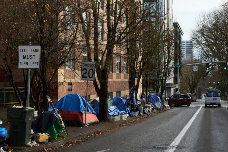 Denver program that pays homeless people a monthly income is open to migrants