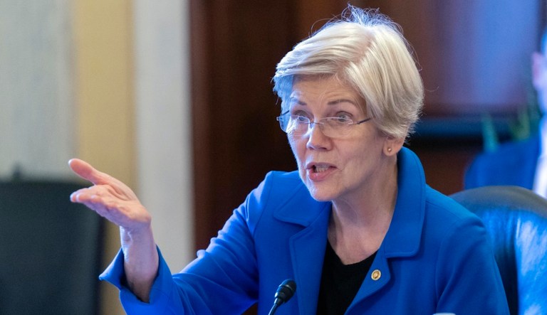 Warren wants Biden regulators to block 