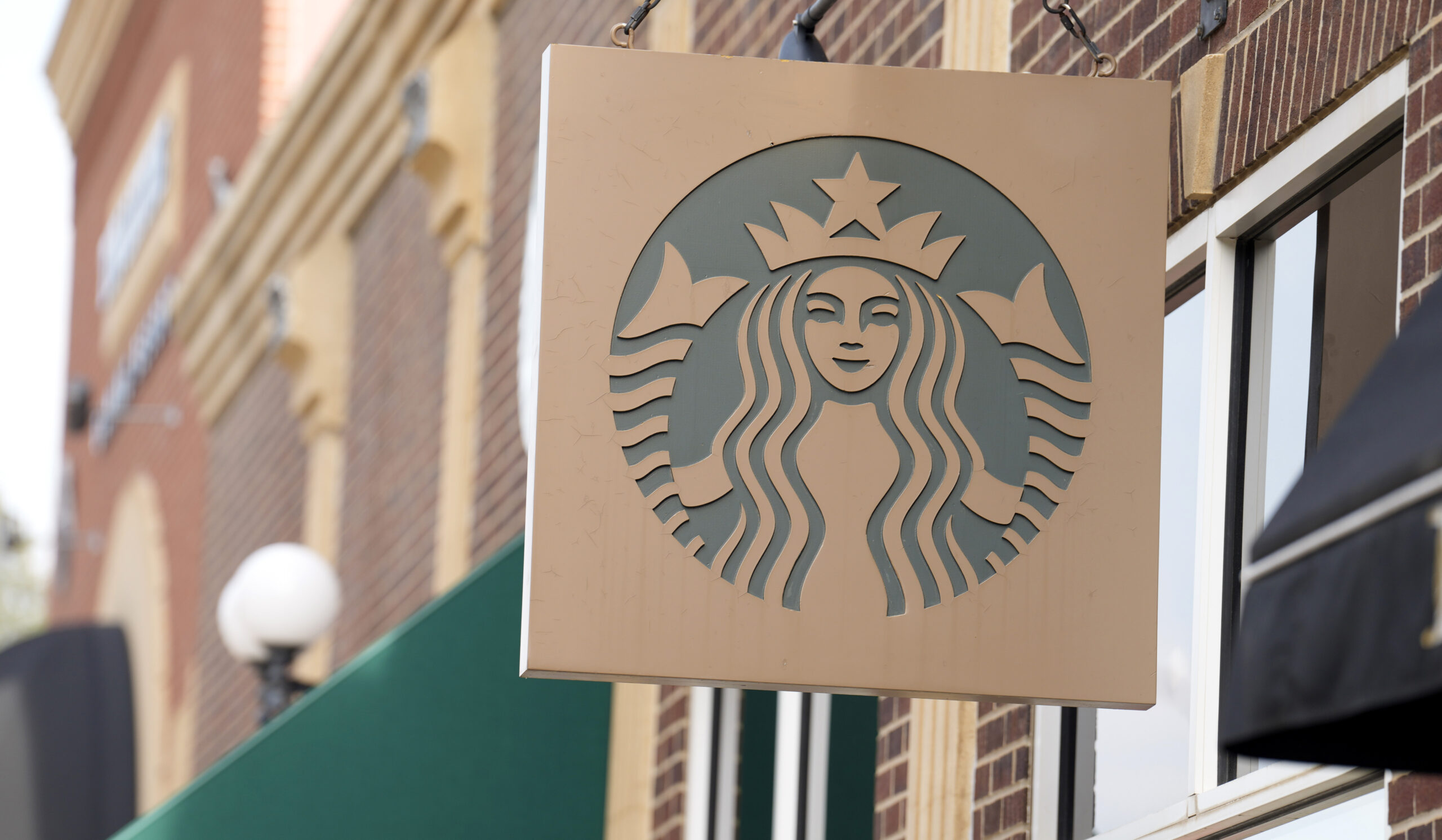 Ex-Starbucks employee suing chain after being fired for fighting off robbers in store