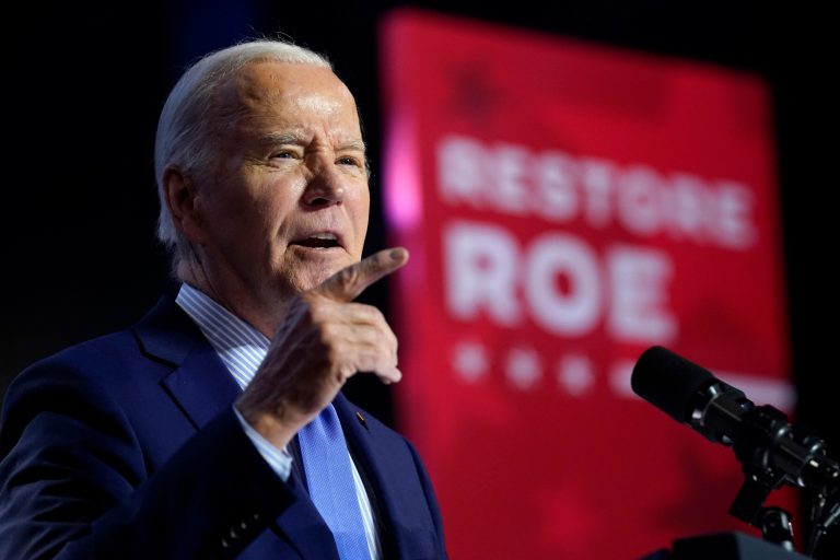 Biden rallies for abortion rights in Virginia on same day as New Hampshire primary