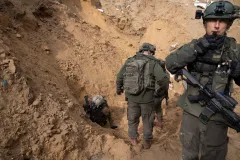 Israel military seizes Hamas funds and intelligence from Gaza bank as it suggests operations may continue further south