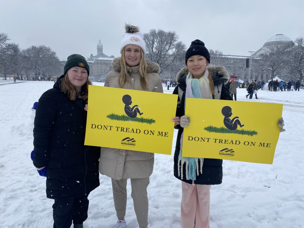(L-R) Dierdra Sullivan, Anna Phillips, and Youngji Cho of South Korea attend the 51st annual March for Life on January 19, 2024. (Washington Examiner; Breccan F. Thies). (L-R) Dierdra Sullivan, Anna Phillips, and Youngji Cho of South Korea attend the 51st annual March for Life on January 19, 2024. (Washington Examiner; Breccan F. Thies).