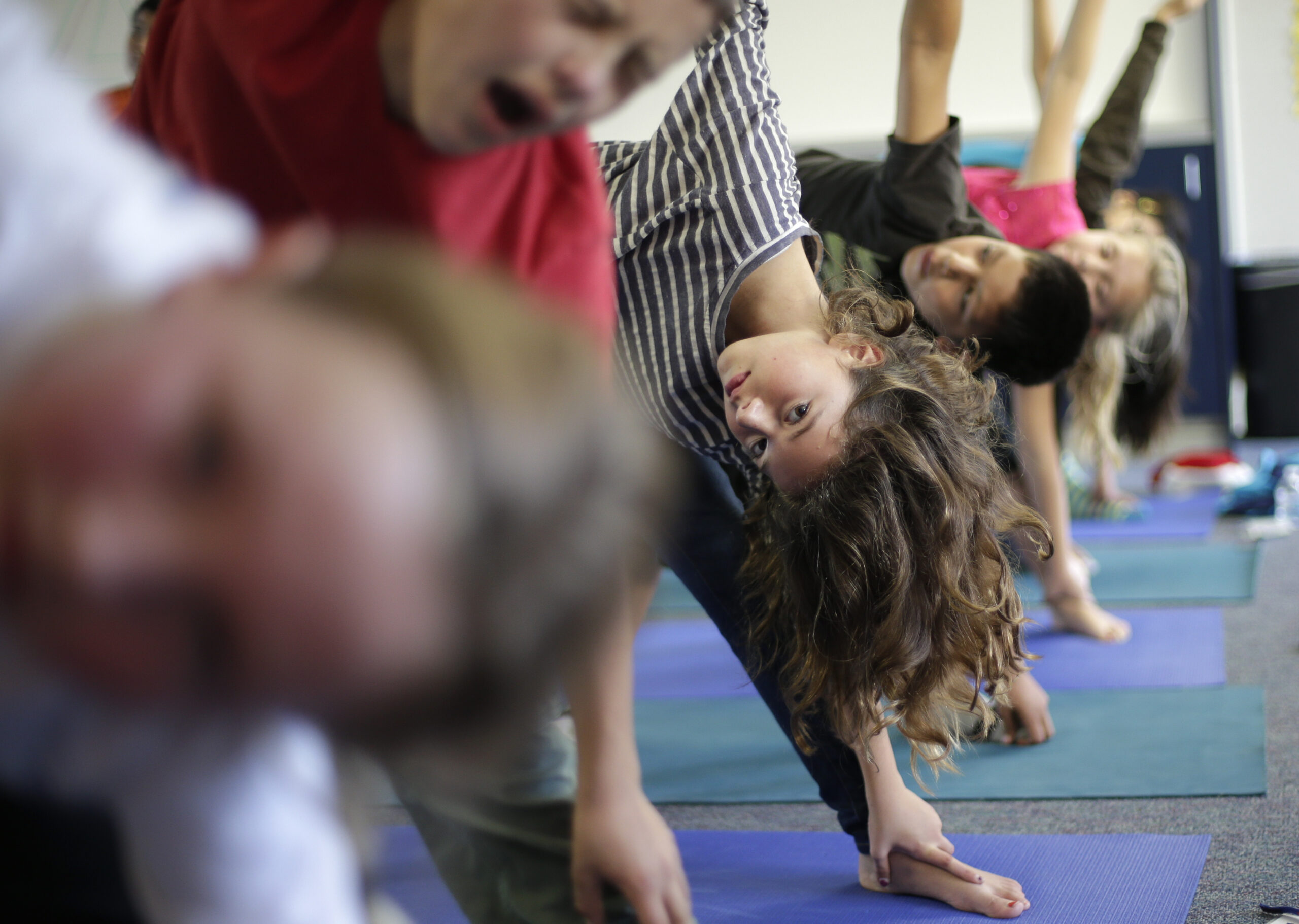 School yoga tries to avoid religious controversy