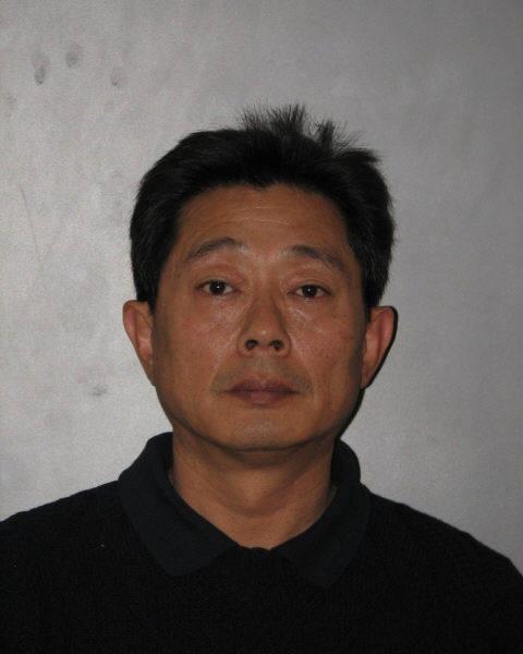 Man charged with embezzlement in visa fraud scheme