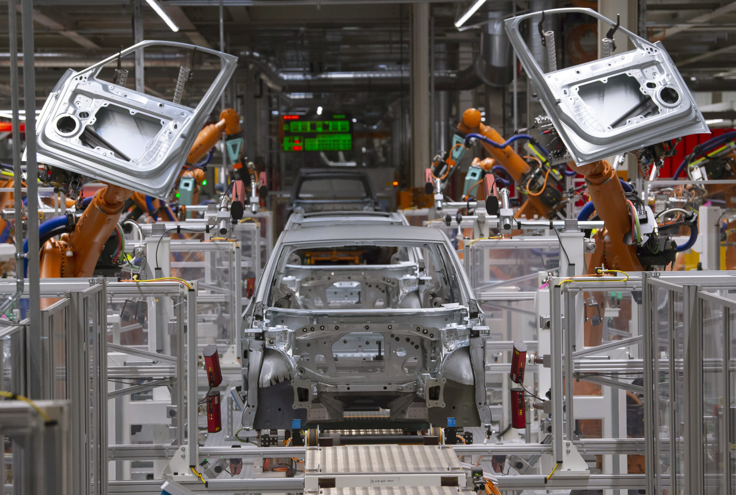 Automakers scramble to adjust to new electric vehicle subsidy rules and uncertainty