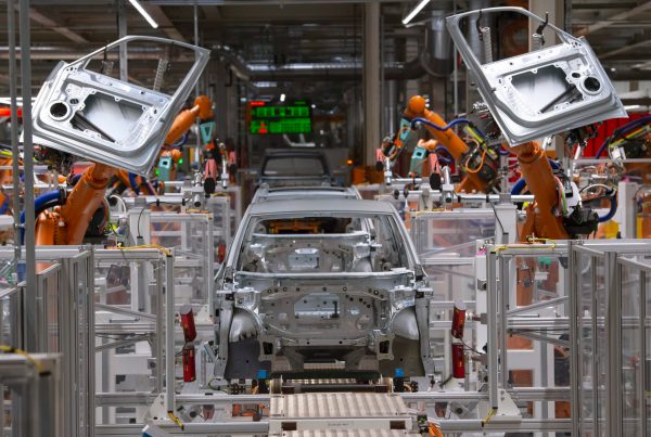 Automakers scramble to adjust to new electric vehicle subsidy rules and uncertainty
