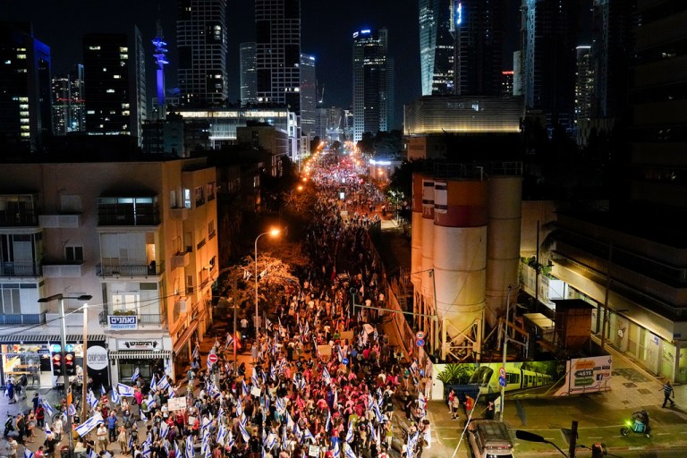 Israelis protest against plans by Prime Minister Benjamin Netanyahu's government to overhaul the judicial system in Tel Aviv, Israel, Saturday, Sept. 23, 2023. 