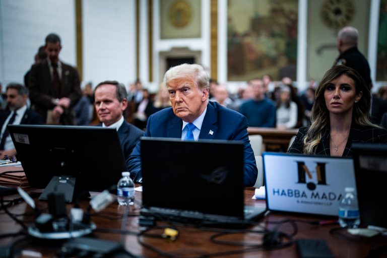 Trump defends business empire during hours of heated testimony