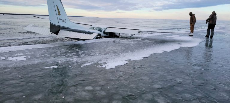 This Dec. 19, 2023 photo provided by the Beltrami County Sheriff's Office in Minnesota shows a plane that fell through ice on Upper Red Lake in Washkish, Minn.