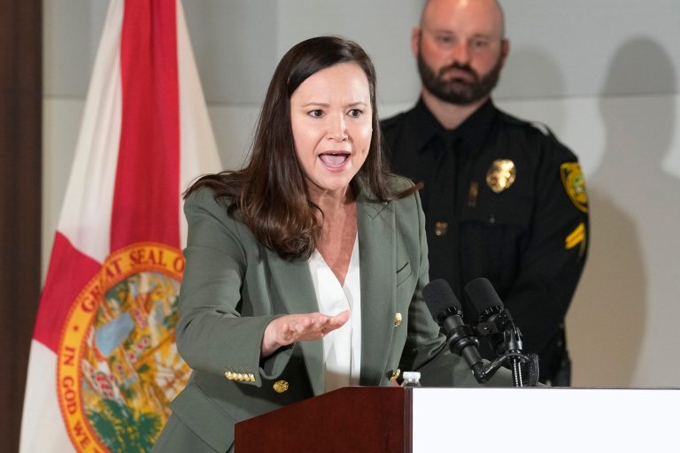 FILE - Florida Attorney General Ashley Moody speaks at a news conference, Jan. 26, 2023, in Miami. 